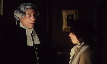 Movie still from “Black Jack” (1979), directed by Ken Loach – A man and a young woman in a room; Medium shot, Over the shoulder angle