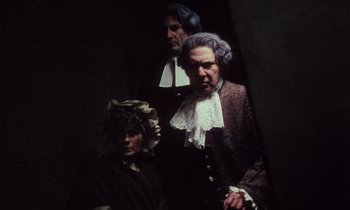 Movie still from “Black Jack” (1979), directed by Ken Loach – A group of people dressed up in historical clothing; Medium shot, High angle