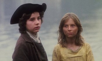 Movie still from “Black Jack” (1979), directed by Ken Loach – Two young people standing next to each other; Medium shot, High angle