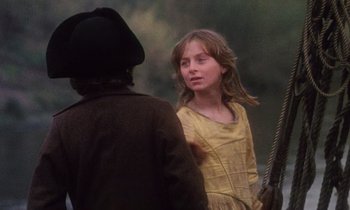 Movie still from “Black Jack” (1979), directed by Ken Loach – A young girl talking to an older man; Medium shot, Over the shoulder angle