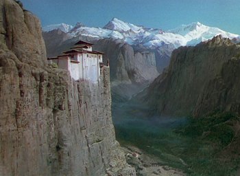 Movie still from “Black Narcissus” (1947), directed by Emeric Pressburger – A view of a mountain range with snow on the top of it; Extreme Wide shot, High angle