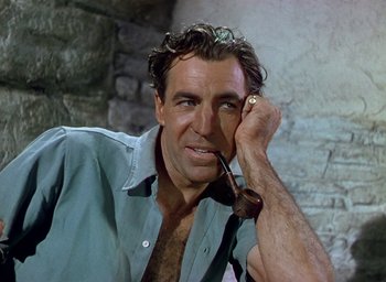 Movie still from “Black Narcissus” (1947), directed by Emeric Pressburger – A person holding a pipe; Close Up shot, High angle