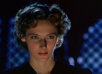 Movie still from “Black Narcissus” (1947), directed by Emeric Pressburger – A person with curly hair; Close Up shot, Low angle