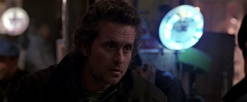 Movie still from “Black Rain” (1989), directed by Ridley Scott – A person with long hair; Close Up shot, Over the shoulder angle