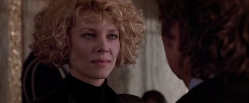 Movie still from “Black Rain” (1989), directed by Ridley Scott – A person wearing a black shirt; Close Up shot, Over the shoulder angle