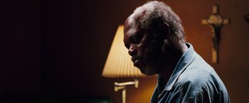 Movie still from “Black Snake Moan” (2006), directed by Craig Brewer – An older man is looking down at the floor; Close Up shot, High angle