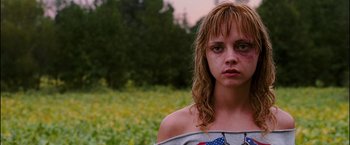 Movie still from “Black Snake Moan” (2006), directed by Craig Brewer – A young woman with a sad look on her face; Close Up shot, Low angle