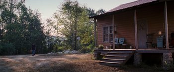 Movie still from “Black Snake Moan” (2006), directed by Craig Brewer – A wooden house sitting in the middle of a field; Extreme Wide shot, High angle