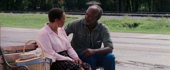 Movie still from “Black Snake Moan” (2006), directed by Craig Brewer – An older man sitting next to an older woman; Medium shot, Over the shoulder angle
