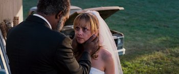 Movie still from “Black Snake Moan” (2006), directed by Craig Brewer – A man putting a veil on a woman's face; Close Up shot, Over the shoulder angle