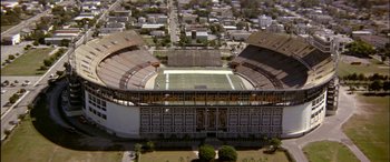Movie still from “Black Sunday” (1977), directed by John Frankenheimer – An aerial view of an empty football stadium; Extreme Wide shot, High angle