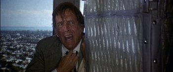 Movie still from “Black Sunday” (1977), directed by John Frankenheimer – A person with a tie; Close Up shot, Low angle