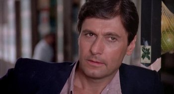 Movie still from “Blame It on Rio” (1984), directed by Stanley Donen – A person wearing a jacket; Close Up shot, Low angle