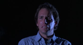 Movie still from “Blood Simple” (1984), directed by Joel Coen – A person smoking a cigarette in the dark; Close Up shot, Low angle