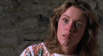 Movie still from “Blood Simple” (1984), directed by Joel Coen – A person with long hair; Close Up shot, Over the shoulder angle