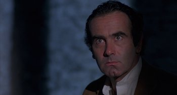 Movie still from “Blood Simple” (1984), directed by Joel Coen – A person wearing a jacket; Close Up shot, Low angle