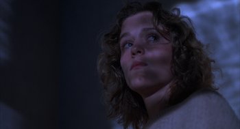 Movie still from “Blood Simple” (1984), directed by Joel Coen – A person looking up at the sky; Close Up shot, Low angle
