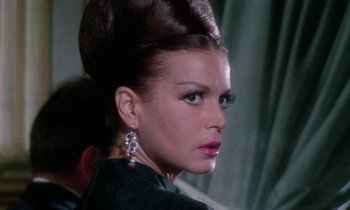 Movie still from “Blood and Black Lace” (1964), directed by Mario Bava – A person wearing a dress; Close Up shot, Low angle
