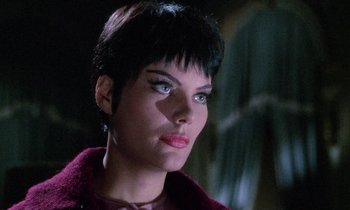 Movie still from “Blood and Black Lace” (1964), directed by Mario Bava – A woman that is looking into the distance; Close Up shot, Low angle