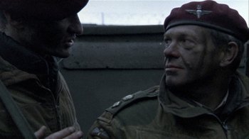 Movie still from “Bloody Sunday” (2002), directed by Paul Greengrass – Two men in military uniforms talking to each other; Close Up shot, Over the shoulder angle