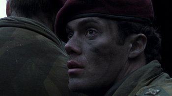 Movie still from “Bloody Sunday” (2002), directed by Paul Greengrass – A person wearing a hat; Close Up shot, Low angle