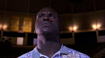 Movie still from “Blue Chips” (1994), directed by William Friedkin – A person looking up at the ceiling; Close Up shot, Low angle