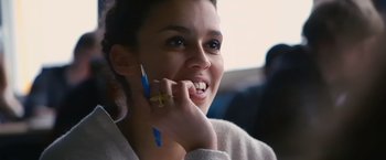 Movie still from “Blue Is the Warmest Colour” (2013), directed by Abdellatif Kechiche – A woman holding a cell phone up to her ear; Close Up shot, Low angle