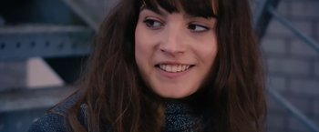 Movie still from “Blue Is the Warmest Colour” (2013), directed by Abdellatif Kechiche – A person with long brown hair; Close Up shot, Over the shoulder angle