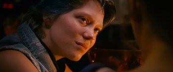 Movie still from “Blue Is the Warmest Colour” (2013), directed by Abdellatif Kechiche – A woman's face with blue hair; Close Up shot, Over the shoulder angle