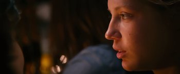 Movie still from “Blue Is the Warmest Colour” (2013), directed by Abdellatif Kechiche – A woman's face in the sunlight; Close Up shot, Over the shoulder angle