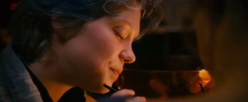 Movie still from “Blue Is the Warmest Colour” (2013), directed by Abdellatif Kechiche – A woman with a pen in her mouth; Close Up shot, High angle