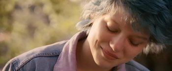 Movie still from “Blue Is the Warmest Colour” (2013), directed by Abdellatif Kechiche – A woman's face with her eyes closed; Close Up shot, Over the shoulder angle