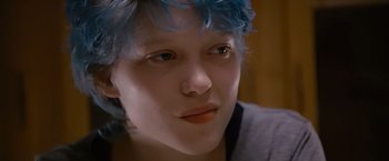 Movie still from “Blue Is the Warmest Colour” (2013), directed by Abdellatif Kechiche – A person with blue hair; Close Up shot, Low angle