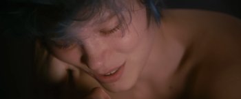 Movie still from “Blue Is the Warmest Colour” (2013), directed by Abdellatif Kechiche – A person with blue hair; Extreme Close Up shot, Overhead angle