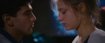 Movie still from “Blue Is the Warmest Colour” (2013), directed by Abdellatif Kechiche – A woman's face and a man's face; Close Up shot, Low angle
