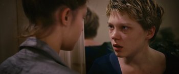 Movie still from “Blue Is the Warmest Colour” (2013), directed by Abdellatif Kechiche – Two young people are looking at one another; Close Up shot, Over the shoulder angle