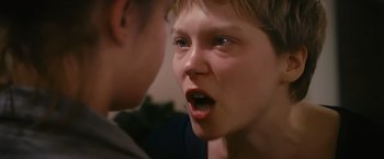 Movie still from “Blue Is the Warmest Colour” (2013), directed by Abdellatif Kechiche – Two young boys are looking at one another; Close Up shot, Over the shoulder angle