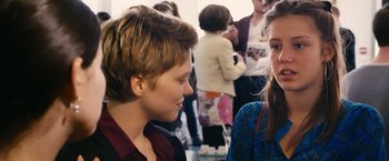 Movie still from “Blue Is the Warmest Colour” (2013), directed by Abdellatif Kechiche – A boy and a girl are talking to each other; Close Up shot, Over the shoulder angle