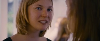 Movie still from “Blue Is the Warmest Colour” (2013), directed by Abdellatif Kechiche – A woman's face with blue eyes; Close Up shot, Over the shoulder angle