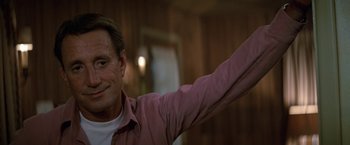 Movie still from “Blue Thunder” (1983), directed by John Badham – A person raising his arm; Close Up shot, Low angle