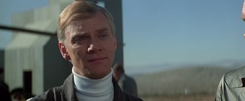 Movie still from “Blue Thunder” (1983), directed by John Badham – A person wearing a jacket; Close Up shot, Low angle