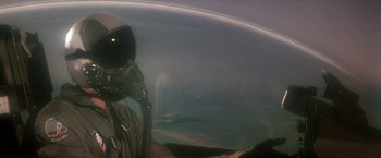 Movie still from “Blue Thunder” (1983), directed by John Badham – A view of the earth taken from a space station; Medium shot, Low angle