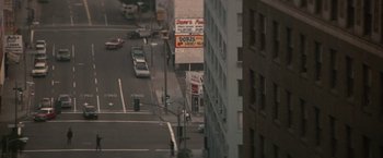 Movie still from “Blue Thunder” (1983), directed by John Badham – A view of a city street from a high rise building; Extreme Wide shot, High angle