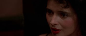 Movie still from “Blue Velvet” (1986), directed by David Lynch – A person with red lipstick; Extreme Close Up shot, Over the shoulder angle