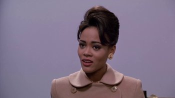 Movie still from “Boomerang” (1992), directed by Reginald Hudlin – A person wearing a coat; Close Up shot, Low angle