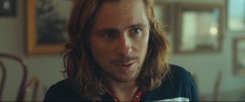 Movie still from “Borg vs. McEnroe” (2017), directed by Janus Metz – A person with long brown hair; Close Up shot, Over the shoulder angle