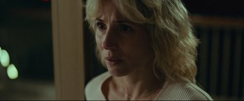 Movie still from “Borg vs. McEnroe” (2017), directed by Janus Metz – A person with blonde curly hair; Close Up shot, Over the shoulder angle