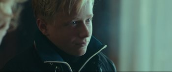 Movie still from “Borg vs. McEnroe” (2017), directed by Janus Metz – A person wearing a black jacket; Close Up shot, Over the shoulder angle