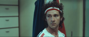 Movie still from “Borg vs. McEnroe” (2017), directed by Janus Metz – A person wearing a headband; Close Up shot, Low angle