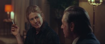 Movie still from “Borg vs. McEnroe” (2017), directed by Janus Metz – A man and a woman are looking at one another in the mirror; Close Up shot, Over the shoulder angle